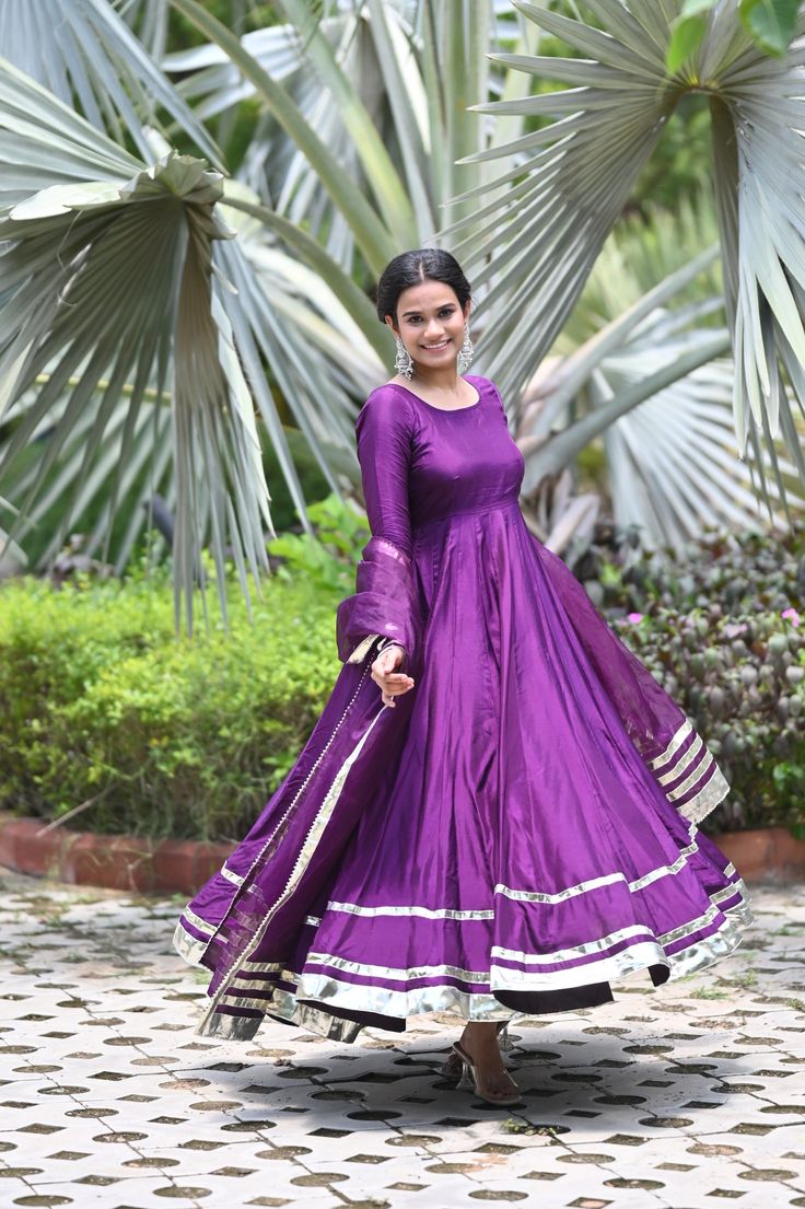 PRODUCT DESCRIPATION This festive season , be ready to impress! Shop it now and make Diwali memorable!Anarkali :- Upada silkPant :- CottonDupatta :- Organza silkClosure Used:- Side zipColor:- Deep purpleCare Instructions :- Dry clean onlyModel Size :- Model is wearing XS sizeModel Height :- 5.5'DISCLAIMER :- Slight color variations may occur due to different screen resolution. Anarkali Floor-length Raw Silk Churidar, Anarkali Art Silk Churidar For Navratri, Navratri Anarkali Art Silk Churidar, Anarkali Tissue Silk Salwar Kameez For Diwali, Silk Anarkali Set For Diwali, Navratri Silk Anarkali Set, Anarkali Kurta With Pallu In Tissue Silk, Raw Silk Anarkali Churidar For Festive Occasions, Anarkali Salwar Kameez In Raw Silk