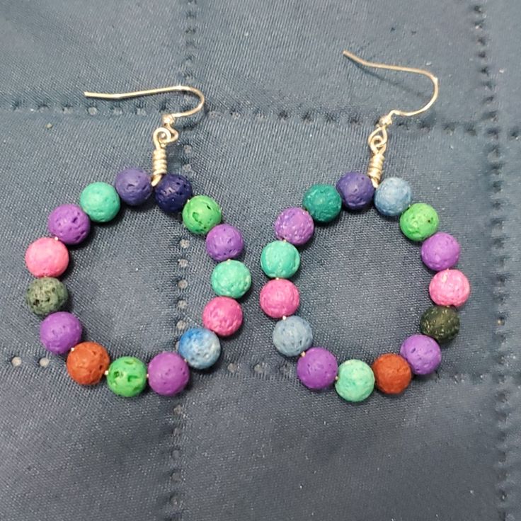 Made With Multicolor Lava Beads- Non-Tarnish Silver-Plated Wire+ Ear Wire. Measurements:2 X 1.25 Inches. Make Me An Offer. If It's Reasonable I'll Work With You! Multicolor Wire Wrapped Round Earrings, Multicolor Wire Wrapped Hoop Earrings Gift, Multicolor Wire Wrapped Hoop Earrings For Gifts, Multicolor Hoop Earrings With Ear Wire For Gifts, Multicolor Hoop Earrings With Ear Wire As A Gift, Multicolor Hoop Earrings With Round Beads, Multicolor Wire Wrapped Earrings With Round Beads, Multicolor Hoop Earrings With Ear Wire, Multicolor Wire-wrapped Beaded Earrings For Gift