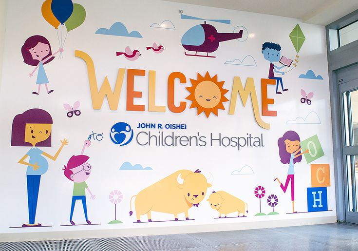 the children's hospital sign is decorated with cartoon characters and letters that spell out welcome