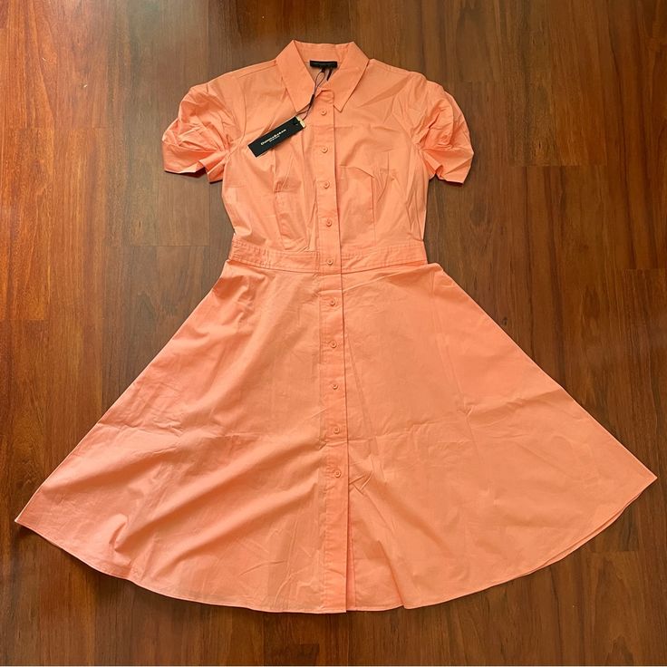 New With Tag Peach Color Fit And Flare Design Front Button Up Collard Neckline 98% Cotton 2% Spandex Length 42” Chest 16.25” Waist 14.75” Please Consider, Color May Look Brighter Or Darker Than True Color Because The Resolution Is Different Each Devices. Fitted Cotton Midi Dress With Button Closure, Solid Fitted Mini Length Shirt Dress, Solid Fitted Mini Shirt Dress, Fitted Solid Mini Shirt Dress, Fitted Solid Color Mini Shirt Dress, Fitted Solid Color Button-up Shirt Dress, Summer Collared Fitted Midi Dress, Fitted Collared Summer Midi Dress, Collared Fitted Midi Dress For Summer