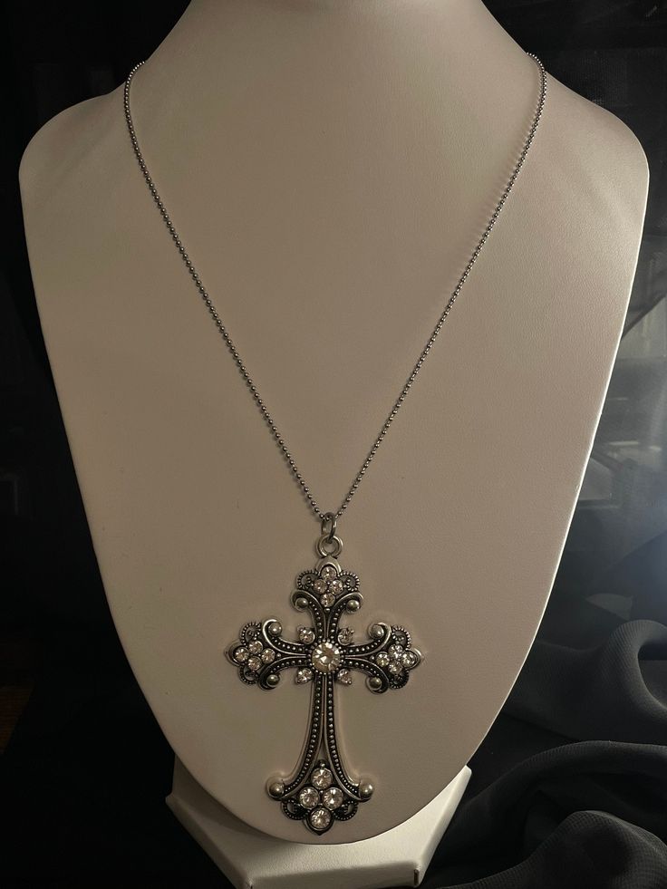 Mcbling Cross Necklace *Perfect for any mcbling/trashy y2k look, would go with gothic styles incredibly well as well; or any style really. *Alloy pendant, stainless steel chain. *Freebies over £10. Trashy Y2k Mcbling, Mcbling Trashy Y2k, 2000s Accessories, 2000s Jewelry, Multiple Ear Piercing, Grunge Accessories, Gothic Pendant, Goth Necklace, Y2k Necklace