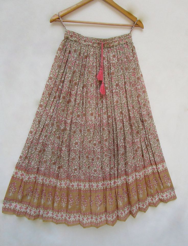 "ITEM DESCRIPTION golden pink flower printed cotton long maxi skirts - ethnic wear bohemian look maxi skirts Material: 100% cotton cambric soft crinkled fabric Length: - 38 inch long Waist :-28.00 inch full (14 inch half) 28 inch relaxed can stretch up to 50 inch Size: free size (fit to all) PRODUCT NAME: - Long Women Maxi skirts Ladies Vintage Long skirts Company Return Policy: Please write for more information to my email directly CHOOSE \"ASK SELLER QUESTION \" payment policy:- we accepts pay Bohemian Maxi Length Pink Skirt, Bohemian Pink Maxi Skirt, Bohemian Cotton Maxi Skirt For Festivals, Pink Floral Print Flowy Maxi Skirt, Bohemian Pink Floral Print Maxi Skirt, Traditional Pink Skirt For Festival, Traditional Pink Skirt For Spring, Traditional Pink Skirt For Summer, Traditional Pink Summer Skirt