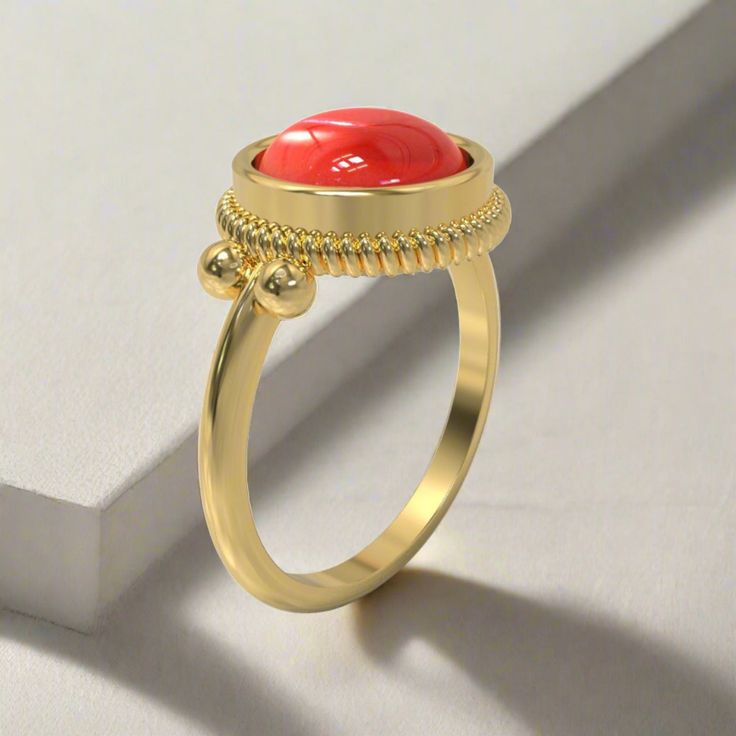 This stately ring is quintessentially classic in design, and is based on several Roman examples dating to the first and second centuries AD found in Bay of Naples towns, and in areas that were at one point known as Roman Britain. Its focal point is a prominent round stone in a bezel setting, which is crowned by a brilliant ribbed border. "Dignitas" was an important and serious concept in the Roman world - and something to which all Romans aspired - though it is difficult to define today. It mean Timeless Adjustable Oval Rings, Timeless Domed Cabochon Rings, Elegant Oval Ruby Stackable Ring, Elegant Domed Jewelry With Bezel Setting, Oval Ruby Ring Stackable For Formal Occasions, Red Domed Rings For Anniversary, Timeless Domed Gemstone Jewelry, Timeless Cabochon Ring, Red Domed Anniversary Ring