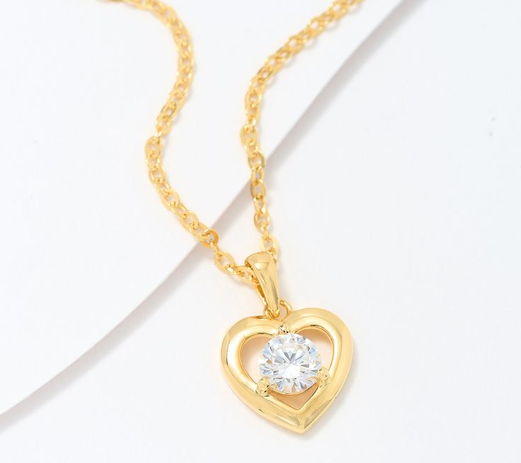 A little bling puts some zing into the heart of this pendant necklace. The universal symbol of love is an elegant way to express your affection for someone special or to provide some heartfelt pampering for yourself. Heart Pendant Charm Necklace With Cubic Zirconia For Gift, Gift Cubic Zirconia Heart Pendant Charm Necklace, Heart Pendant Necklace With Delicate Chain For Her, Open Heart Cubic Zirconia Necklace Gift For Her, Open Heart Cubic Zirconia Necklace Gift, Elegant Double Heart Necklace As Gift, Mother's Day Cubic Zirconia Necklace With Heart Charm, Mother's Day Cubic Zirconia Heart Pendant Necklace, Valentine's Day Cubic Zirconia Heart Necklace