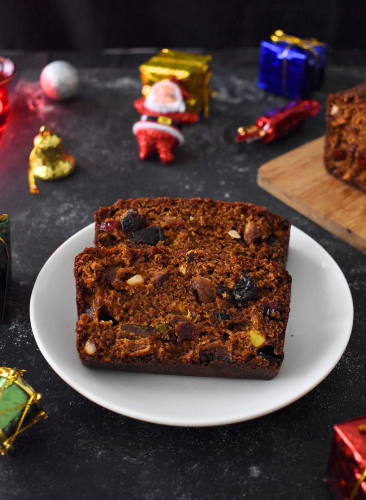 two slices of christmas cake on a plate