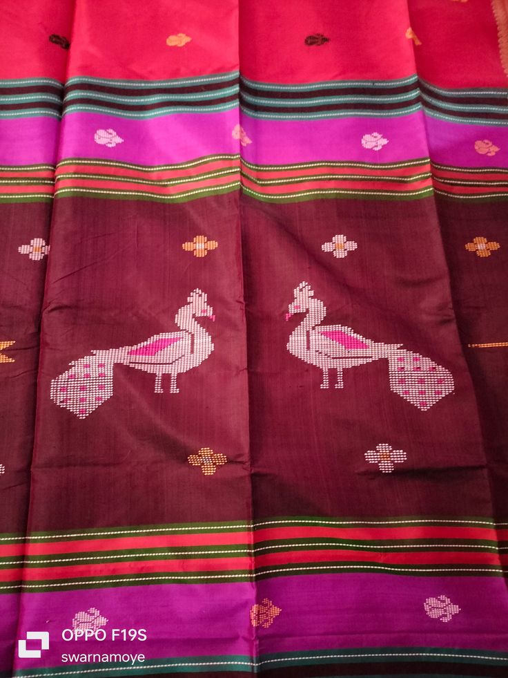 Product Details : Saree Type : Hand weaving katan silk saree with blouse piece, kalakhetra saree,colour red and brown , peacock bird motive saree,Indian saree,Bengali saree,ethnic design saree ,Bengali traditional and ethnic wear,women formal wear ,ethnic saree,saree for women,women garments. Blouse Piece : Yes (Un-Stitched) Saree Length : 6.5 Meters Blouse Piece Length : 80 cm Saree Weight : 0.4 kg Saree Fabric : Katan silk  Color : As shown in the picture Work : weaving Pattern : designer Occasion: Formal Wear, Festival Wear , Marriage Function Wear, Casual Wear, Regular Use. Washing Instructions : Dry Clean Only Fall and Pico: On request Blouse Stitching : Available for an additional cost. (Please contact us for Blouse Stitching Work) Disclaimer : 1. The color of actual product may vary Red Paithani Silk Blouse With Motifs, Brown Dupatta For Puja And Festivals, Red Handloom Paithani Silk Traditional Wear, Traditional Brown Dupatta With Weaving Work, Traditional Brown Saree With Cutdana, Red Handloom Paithani Silk Dupatta, Festive Red Blouse Piece With Weaving Work, Festive Red Blouse With Weaving Work, Brown Traditional Wear With Motifs For Festivals