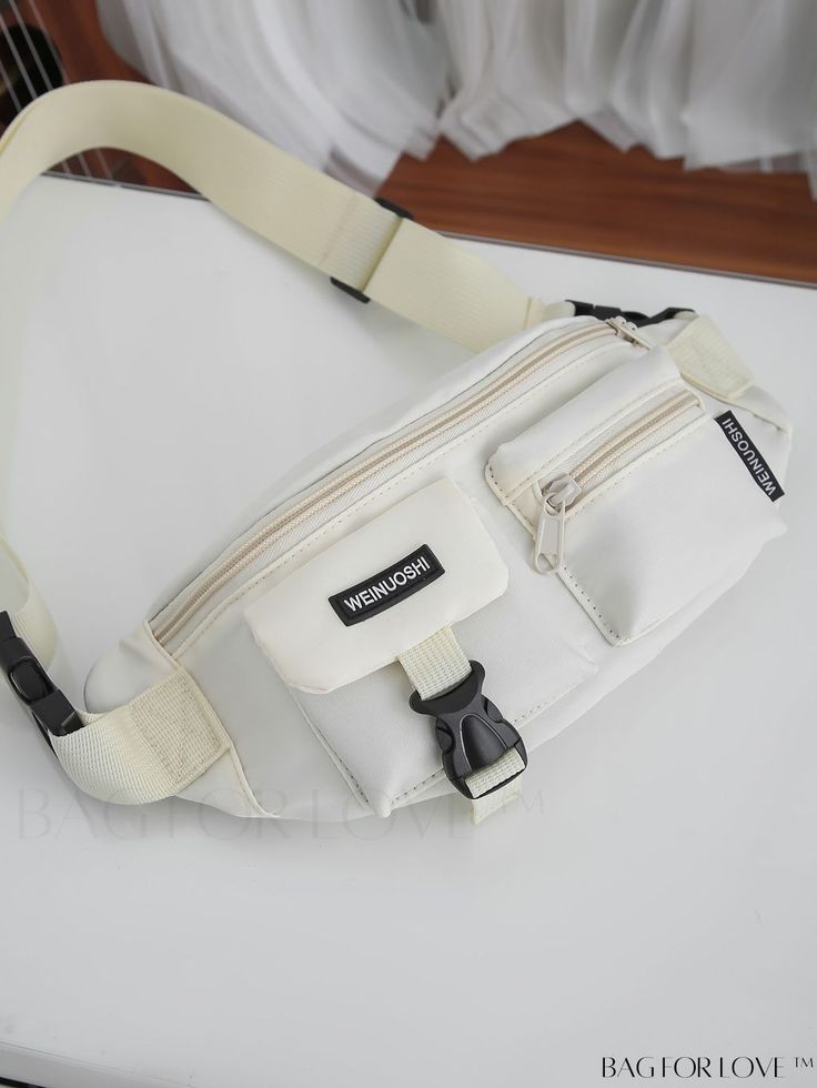 BagForLove - Front Pocket Fanny Pack with Letter Patch Decor Product Description Color White Bag Size Medium Pattern Type Plain Type Bum Bag Composition 100% Nylon Material Polyamide Size Chart INCH CM Strap Length Bag Height Bag Width Bag Length 39.4 inch 5.9 inch 3.1 inch 13 inch Strap Length Bag Height Bag Width Bag Length 100 cm 15 cm 8 cm 33 cm Details Pictures Similar Products h2 { text-align: center; } /* æ¢è¡ */ li{ white-space: normal; word-break: break-all; word-wrap: break-word; } . Large Capacity White Pouch For Everyday Use, White Pouch Chest Bag With Removable Pouch, Casual White Pouch Chest Bag, Large Capacity White Travel Pouch, White School Pouch Belt Bag, White Pouch Belt Bag For School, White Large Capacity Casual Belt Bag, Casual White Belt Bag With Large Capacity, Casual White Belt Bag With Adjustable Strap