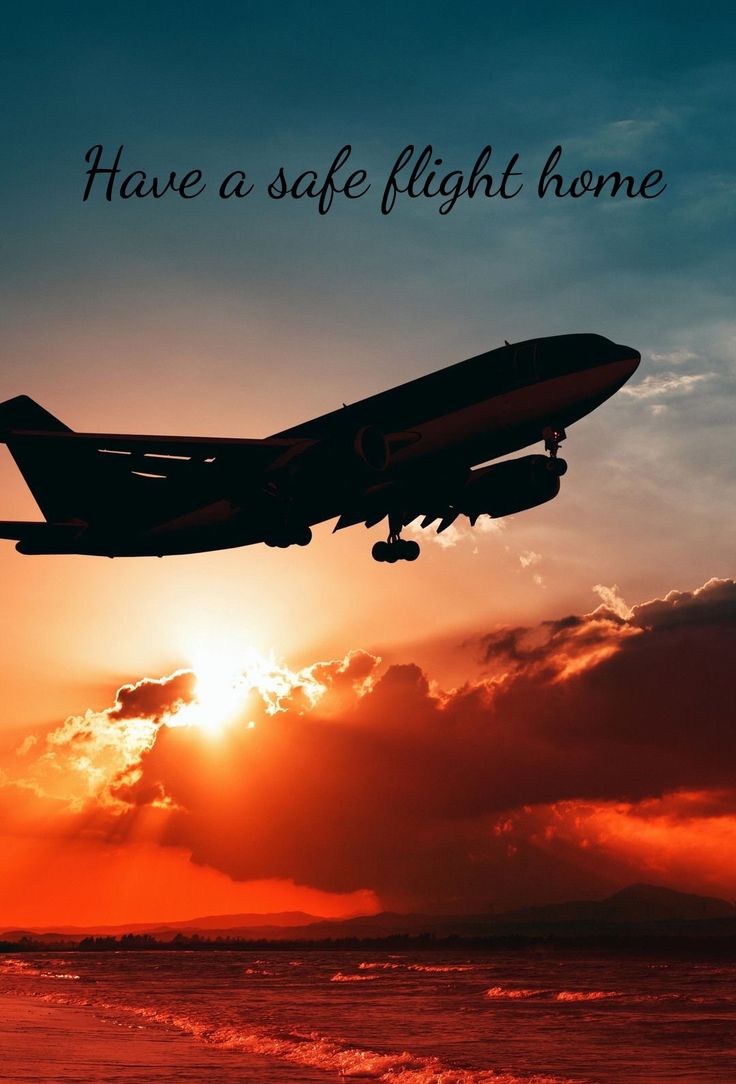 an airplane flying over the ocean at sunset with words above it that say, have a safe flight home