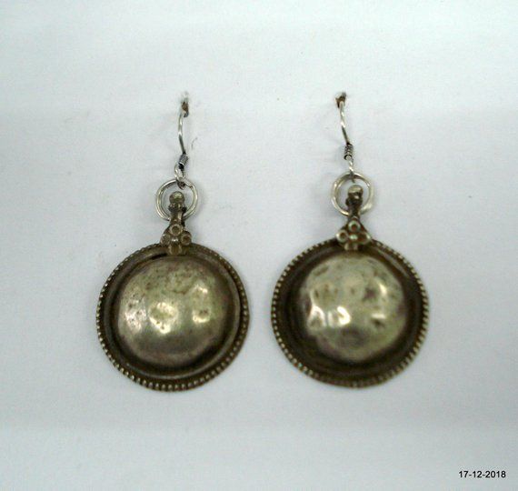 vintage antique tribal old silver earrings disk design traditional jewelry Antique Round Engraved Earrings, Antique Engraved Round Earrings, Antique Finish Round Metal Earrings, Round Metal Earrings With Antique Finish, Vintage Round Earrings For Festivals, Traditional Round Engraved Earrings, Traditional Engraved Round Earrings, Traditional Handmade Round Pendant Earrings, Traditional Silver Round Pendant Earrings