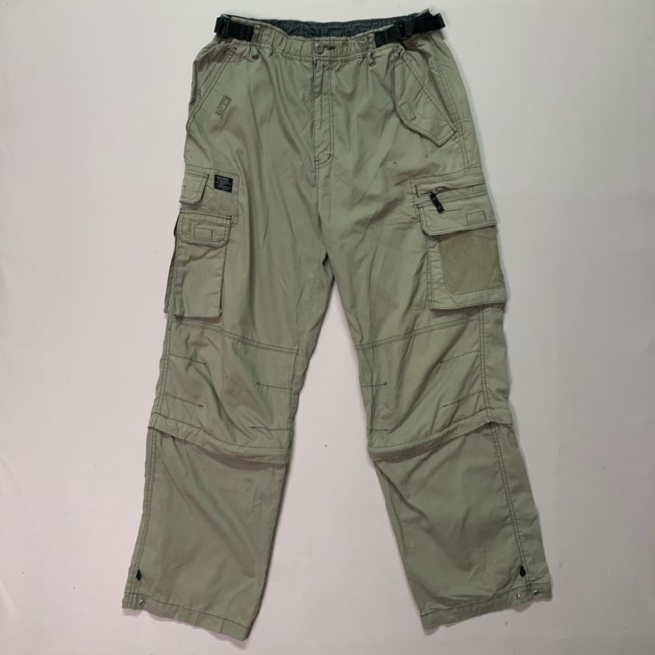 [DESCRIPTION] Please read the description first before buy my items‼️‼️‼️ Gord Sord Utility Multipocket Tactical Cargo Pants  All in good condition [MATERIAL] Cutto  [MEASUREMENT] Measurement ( WHEN LAID FLAT ): Waist: 32 inch (recommended) Insean: 29.5 inch Length: 40 inch Front Rise: 11.5 inch Thigh: 23 inch Opening Leg: 18 inch [CONDITION] - All in good condition  - No hole no stain [PAYMENT & NOTICE] - We accept PayPal ONLY - No return/refund - All items will be post over shipping company co Combat Style Cotton Bottoms With Pockets, Combat Style Cargo Pants With Belt Loops For Outdoor, Combat Style Cargo Pants For Outdoor Activities, Urban Cargo Pants With Belt Loops For Outdoor, Khaki Cargo Jeans For Outdoor Activities, Cotton Parachute Pants With Pockets For Outdoor Activities, Combat Cargo Pants With Pockets, Khaki Combat Pants With Pockets, Outdoor Full Length Cargo Pants With Patch Pockets