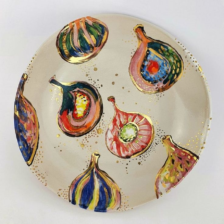 a white plate with colorful designs on it