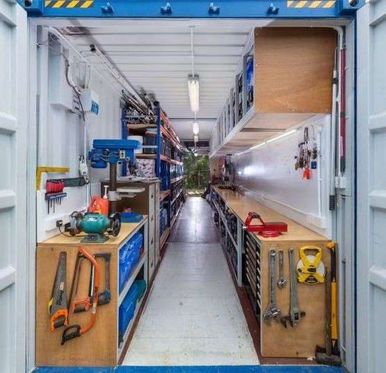 the inside of a storage room with tools in it