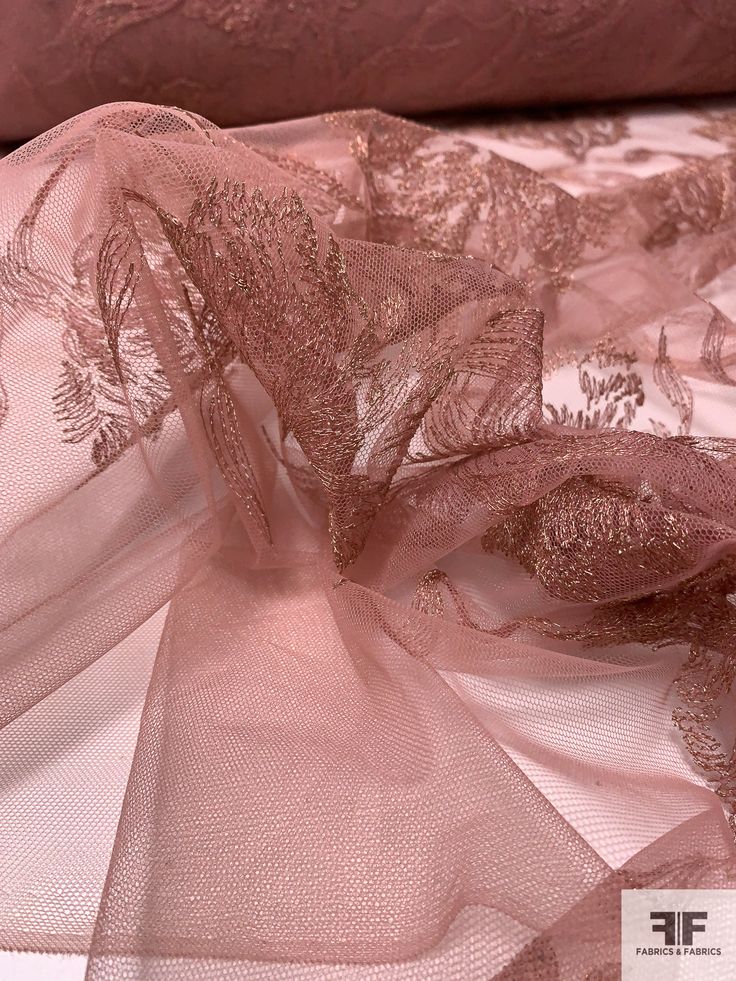 SKU: 15031 Content: Polyester / Lurex Color: Dusty Rose / Gold Width: 55 inches Elegant Pink Lace For Summer, Elegant Pink Lace For Party, Elegant Pink Embroidered Fabric With Lace Work, Pink Embroidered Lace For Party, Elegant Pink Embroidered Lace, Elegant Embroidered Pink Lace, Elegant Pink Fabric For Party, Pink Embroidered Organza Fabric With Lace Work, Pink Embroidered Party Fabric