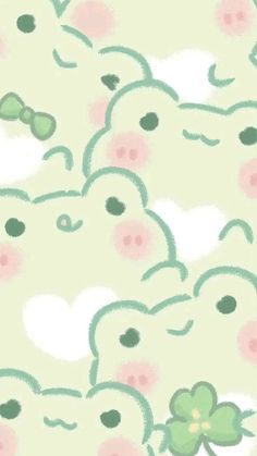 a green and pink cat with four leaf clovers on it's back ground