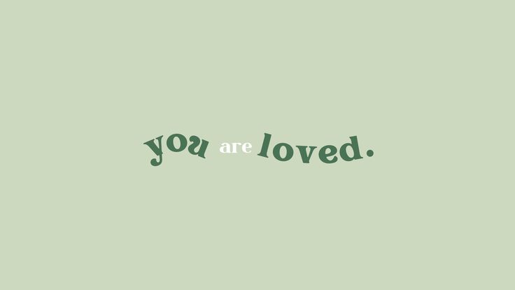 the words you are loved written on a green background