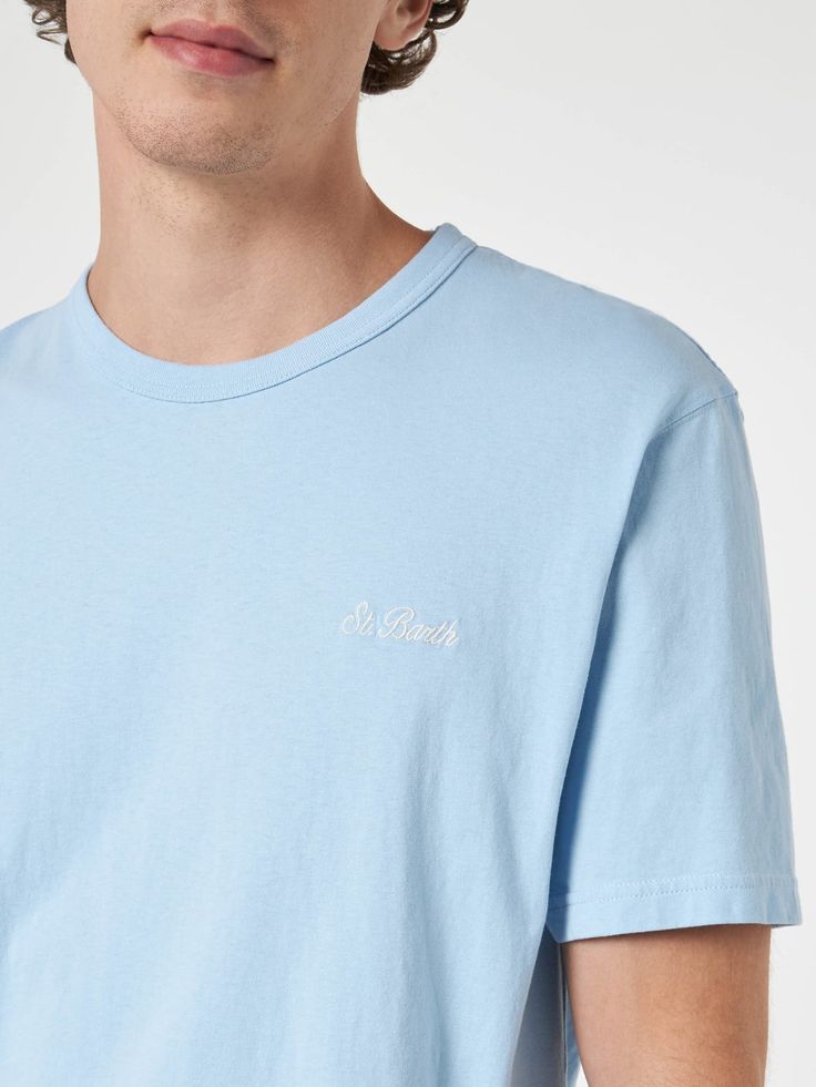 Introducing our Dover crew neck t-shirt, crafted from 100% cotton and available in a variety of solid colors. This essential piece features the exclusive Saint Barth logo embroidered on the chest, adding a touch of sophistication to your everyday wardrobe. Versatile and stylish, the Dover tee is perfect for any occasion, seamlessly blending comfort with effortless elegance. Light blue cotton jersey t-shirtLeft chest exclusive St. Barth logo embroideryPiece-dyedCrewneckExclusive signature St. Bar Cotton Crew T-shirt With Embroidered Graphics, Blue Cotton T-shirt With Embroidered Logo, Crew Cotton T-shirt With Embroidered Logo, Blue Graphic Tee With Embroidered Logo, Crew Neck Cotton T-shirt With Embroidered Graphics, Cotton Crew Neck T-shirt With Embroidered Graphics, Blue Relaxed Fit T-shirt With Embroidered Logo, Blue Cotton Crew T-shirt, Blue Cotton Crew Neck T-shirt