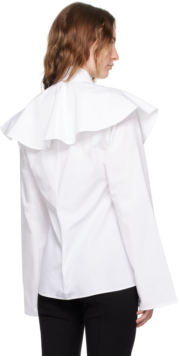 Cotton poplin blouse with detachable shawl. · Spread collar · Button closure Supplier color: White Elegant White Blouse With Hidden Buttons, Formal Poplin Blouse For Spring, Elegant Poplin Tops For Office, Chic Blouse With Hidden Button Closure For Work, Elegant Poplin Tops For The Office, Chic Office Tops With Hidden Button Closure, Elegant Poplin Blouse For Workwear, Elegant Spring Poplin Tops, Chic Collared Blouse With Hidden Button Closure