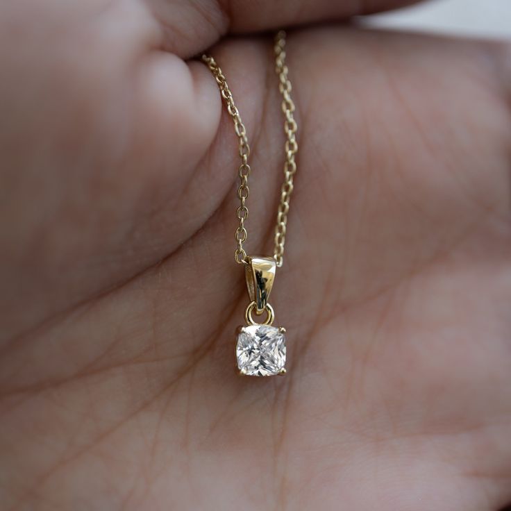 "A beautiful and delicate necklace featuring a cushion stone makes this a super versatile piece. It layers beautifully and also looks great on its own!   - - - D E T A I L S - - -  * Made of 925 Sterling Silver * THICK plating of 14k Gold or Rhodium  * 16\" + 3\" Extension Chain * Nickel-free & Hypoallergenic  * 5x5mm Pendant  * We use the highest grade cubic zirconia for an authentic diamond look! Made with 100% Pure Love! ♡ Comes in a gift-box, ready for gift-giving! 🎁 Happy to answer any questions you may have! 🥰 Let's Connect! 🥰 IG: samijewels_" Gold Jewelry With Cushion Cut Birthstone, Gold Cushion Cut Birthstone Jewelry, Elegant Gold Cushion Cut Necklace, Cushion Cut Necklace With Prong Setting For Wedding, Dainty Necklace Gold, Diamond Pendants Designs, Dainty Gold Necklace, Cushion Diamond, Cz Necklace