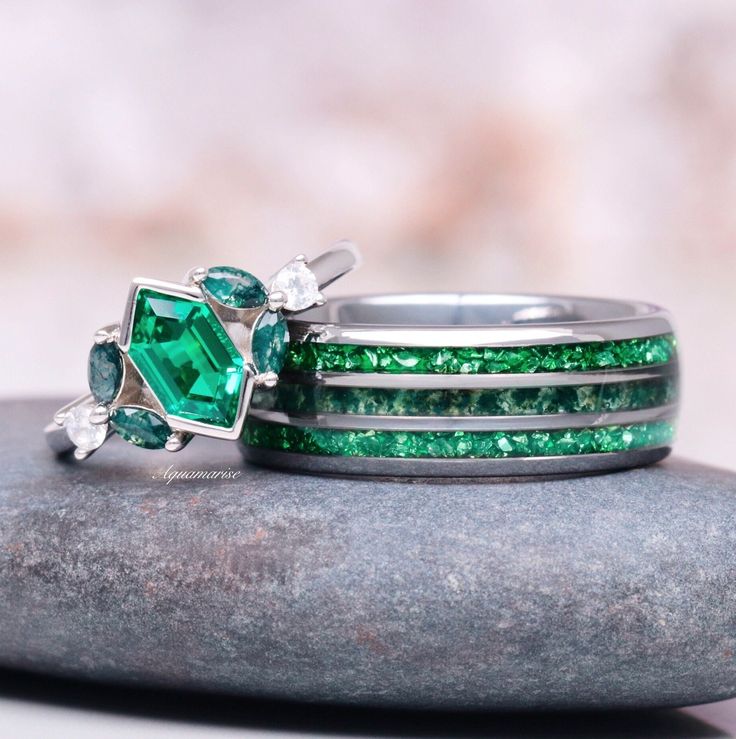 Introducing our exquisite Hexagon Emerald & Moss Agate Couples Ring Set, a perfect symbol of unity and everlasting love. This unique set features two beautifully crafted rings designed to complement each other, just like you and your partner. ►Her Ring: *Material: 925 solid sterling silver with rhodium finish.  *Design: Elegantly set with a striking hexagon-shaped emerald, surrounded by the natural beauty of moss agate accents, this ring is a timeless piece that exudes grace and sophistication. Emerald Cut Gemstone Stackable Wedding Rings, Polished Emerald Ring For Wedding, Emerald Cut Stackable Emerald Rings For Wedding, Wedding Stackable Emerald Rings With Emerald Cut, Emerald Jewelry For Promise Ring With Polished Finish, Wedding Jewelry With Polished Emerald, Polished May Birthstone Jewelry For Weddings, Wedding Emerald Ring Fine Jewelry, Emerald Jewelry With Polished Finish For Anniversary