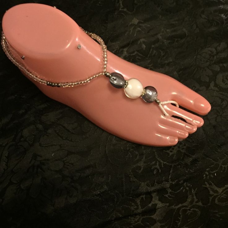 A Pair Of Silver Swirls Barefoots Women's Size 9. Silver, Gray And Clear Glass Beads. A Beautiful Accessory For Many Ocassions, A Day At The Beach, A Wedding, Dressing Up Your Pumps Or Accessorizing An Outfit For An Intimate Evening. Elegant Handmade Silver Barefoot Sandals, Silver Ankle Wrap Barefoot Sandals For Party, Silver Beach Anklets With Silver Beads, Beach Silver Anklets With Silver Beads, Silver Anklets With Beads For Beach, Silver Beaded Anklets For Summer, Silver Anklets With Silver Beads For Beach, Silver Beaded Anklets For Festival, Silver Beaded Festival Anklets