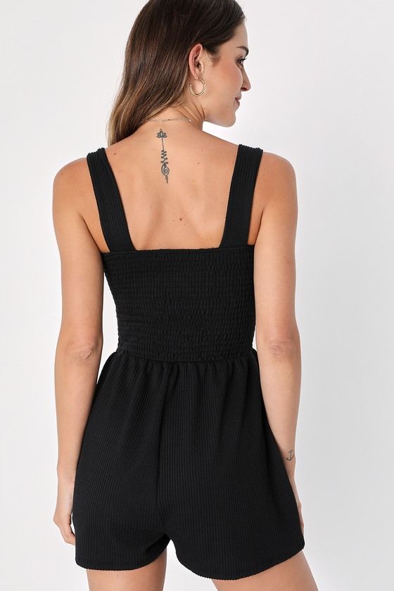 Call up your babe squad and head out for a day on the town in the Lulus Social Calendar Black Ribbed Knit Smocked Romper! Stretchy, textured ribbed knit shapes a straight neckline and a smocked bodice, supported by wide tank straps. An elasticized high waist tops relaxed shorts with hidden side seam pockets. Pair with sandals and a cute hat for a brunch-ready outfit! Fit: This garment fits true to size. Length: Mid-thigh. Size medium measures 29" from shoulder to hem. Inseam: 2.50 Front Rise: 13 Black Sleeveless Smocked Top For Day Out, Black Smocked Top For Day Out, Smocked Romper, Social Calendar, Call Up, Cute Hat, Jumpsuits And Rompers, Lulu Fashion, Knitted Romper