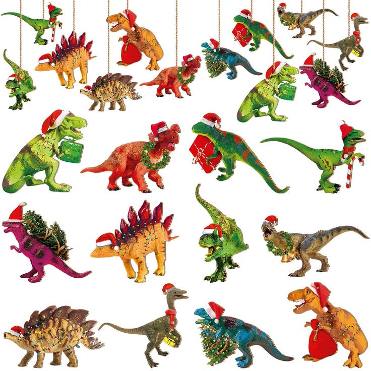 a group of toy dinosaurs hanging from strings on a white background with christmas decorations in the shape of t - rexs