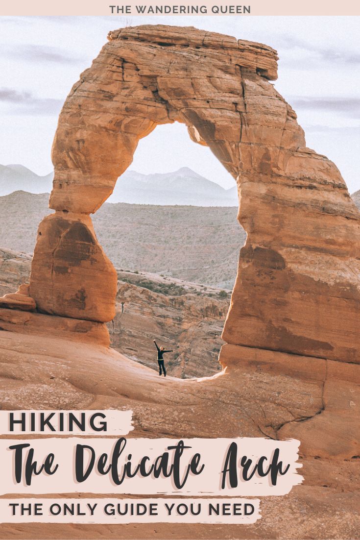 a person standing in front of a rock arch with the words hiking the delicate arch on it