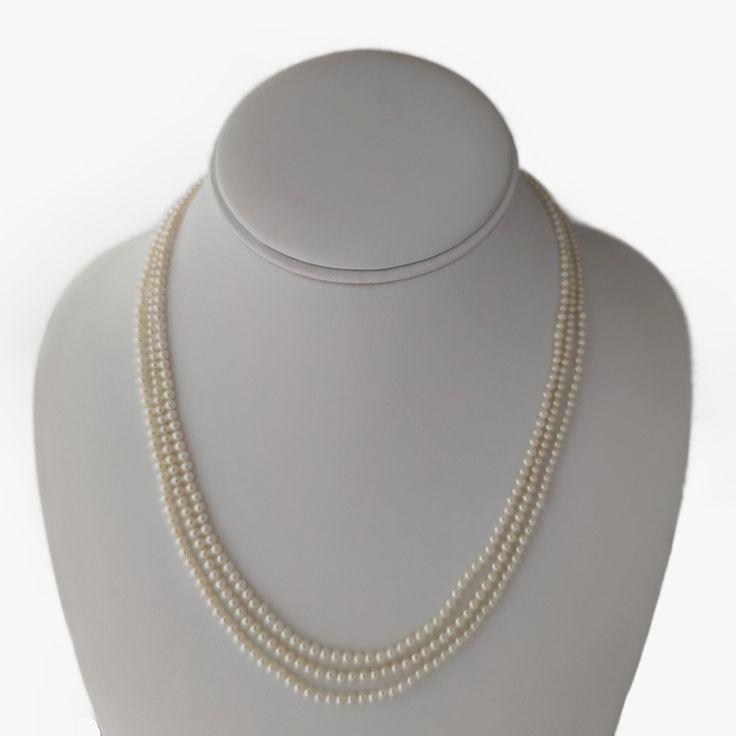 Indulge in the sheer elegance of this dainty Japanese Akoya pearl 3-strand nested necklace. Carefully crafted and finished with a 14K yellow gold Figure 8 Safety clasp, adorned with diamonds (0.10ct, NC.SI), this piece represents a fusion of artistry and luxury. Explore the enchanting world of cultured Akoya pearls, meticulously cultivated in the unspoiled waters of Japan. These tiny pearls exhibit a white color with a silver overtone, embodying grace and sophistication. The pearls, sized 2.5 to Multi-strand Pearl Pendant Necklace For Formal Occasions, Formal Multi-strand Necklace With Pearl Pendant, Elegant Multi-strand Jewelry For Anniversary, Elegant Multi-strand Necklace With Pearl Pendant, Classic Multi-strand Pearl Necklace For Wedding, Elegant Multi-strand Necklace For Anniversary, Elegant Multi-strand Pearl Drop Jewelry, Classic Multi-strand Wedding Jewelry, Elegant Multi-strand Pearl Necklace For Formal Occasions