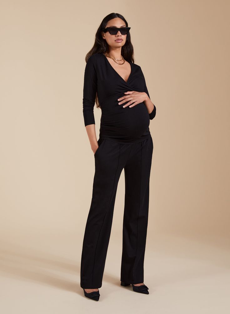 Description Modelled by 35 weeks pregnant Nicole Sara combines the comfort of a track pant with the cut and elegance of a tailored trouser. It’s all down to the stretchy yet structured ponte fabric we’ve used. Blending crisp pintucks down each leg with an elasticated, under-the-bump waistband, you get the best of both worlds. A savvy office-wear investment, go for the full suit by pairing it with the Lisbeth Blazer. Crafted in LENZING™ ECOVERO™ ponte Pockets in side seams Simply pulls on Sits un