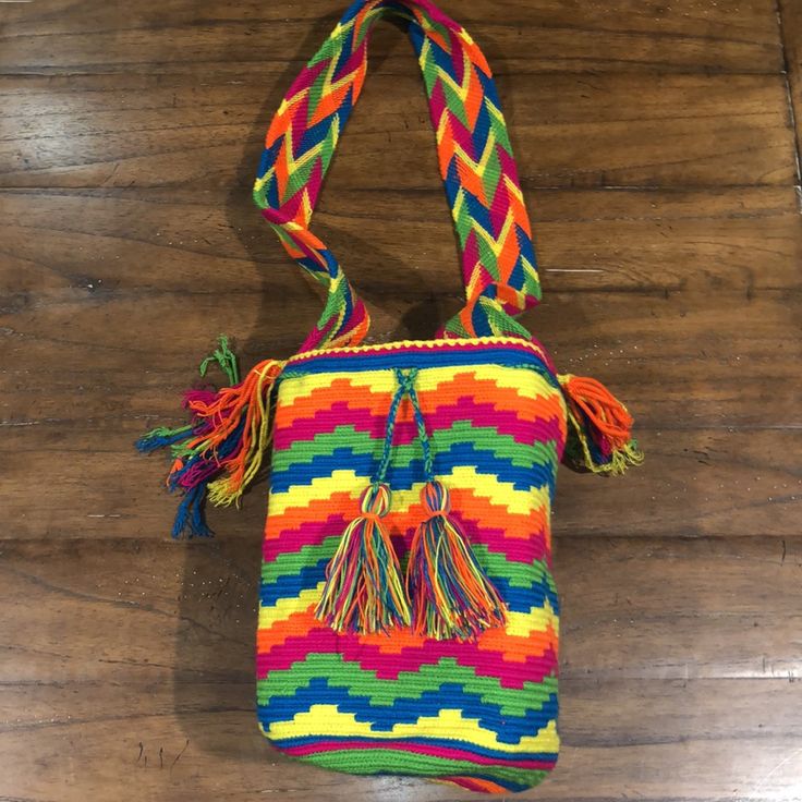 Colombian Wayuu Bags Made In The Guajira Each Is One Of A Kind And Handmade Casual Yellow Crochet Bag With Braided Handles, Casual Multicolor Hobo Bag For Shopping, Summer Yellow Crossbody Bag, Multicolor Satchel Bucket Bag, Multicolor Shopping Bag With Adjustable Strap, Casual Multicolor Bucket Shoulder Bag, Casual Multicolor Shoulder Bag, Casual Multicolor Double Handle Shoulder Bag, Multicolor Satchel-shaped Bucket Bag