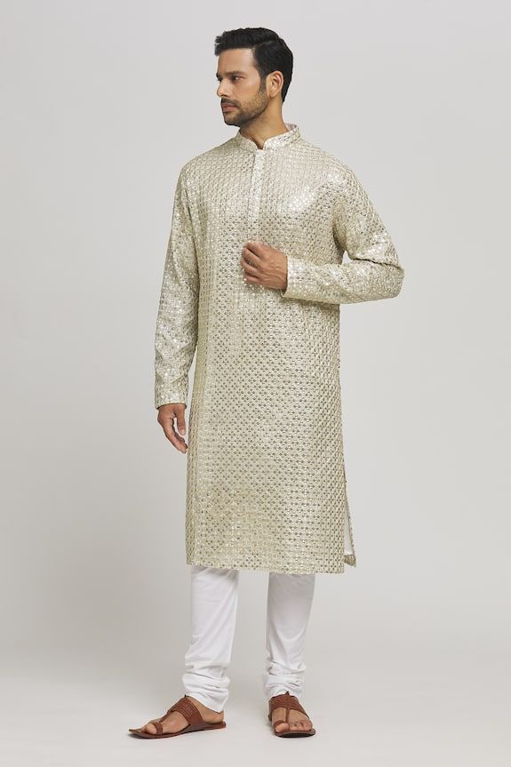 Ivory and golden cotton kurta with mirror and thread embroidery. Comes with churidar. - Aza Fashions Traditional Gold Sherwani With Gota Work, Gold Sherwani With Mirror Work For Diwali, Festive Gold Sherwani With Gota Work, Eid Gold Kurta With Resham Embroidery, Festive Cream Traditional Wear With Gold Embroidery, Designer Gold Sherwani With Gota Work, Gold Sherwani With Resham Embroidery For Navratri, Gold Designer Kurta For Transitional Season, Gold Kurta With Zari Work For Eid