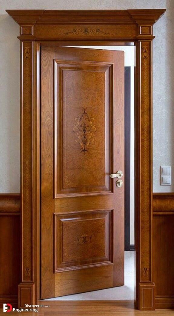 an open wooden door in the middle of a room