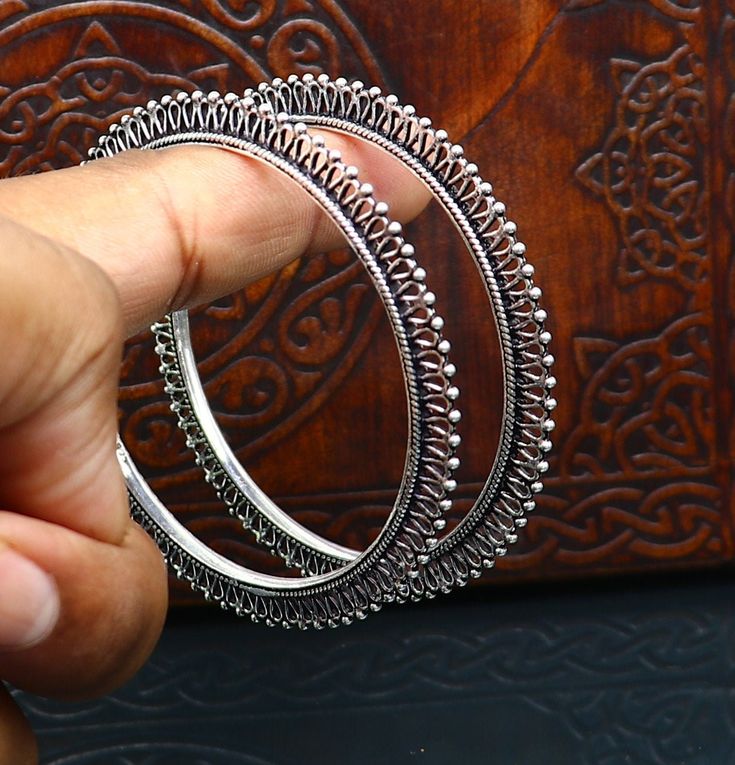 Handmade Toe Ring Jewelry For Diwali, Silver Jewelry For Ceremonial Diwali Occasion, Silver Ceremonial Jewelry For Diwali, Silver Jewelry For Ceremonial Occasions During Diwali, Metal Bangle With Oxidized Finish, Oxidized Metal Bangle, Antique Silver Round Jewelry For Festive Occasions, Antique Silver Openable Jewelry, Silver Bangle Bracelets For Diwali