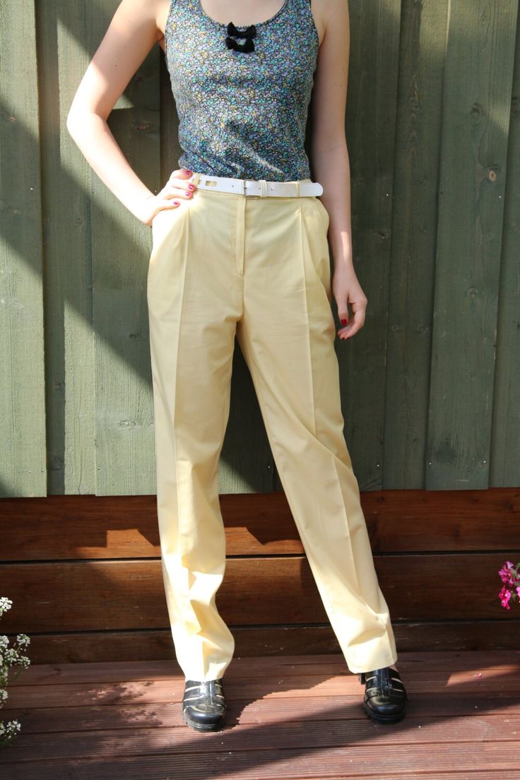 "Vintage Womens Light Yellow High Waist Pants Classic Elegant Trousers With Belted Small Size    Label size: S  Measurements: (lying flat):  Waist: 13\"-  33.5 cm Hips: 16.5\"- 42 cm Width at knee:  9\" - 23 cm Pant leg inseam: 31\" - 79 cm Length:  42\" - 107 cm  Please check measurements to insure a proper fit. Remember to allow yourself some extra room for movement. You can compare these with something from your closet that fits you well.  This pants will come to you freshly laundered and ready to wear. Please convo me if you need additional measurements.  Condition: good Vintage Condition   SHIPPING * I ship worldwide via Priority mail (Latvijas Pasts) from Latvia (EU). * I ship from Europe, so please allow 2 to 4 weeks for the package to arrive if you live overseas. * Europe 5 - 10 bu Fitted High-waisted Summer Chinos, Summer Workwear Full Length Chinos, Spring Workwear Chinos Full Length, Spring Workwear Full-length Chinos, Summer Stretch Trousers Work Pants, Classic Full Length Dress Pants For Summer, Fitted High Waist Work Pants For Summer, Fitted Straight Leg Chinos For Summer, Fitted Straight Chinos For Summer