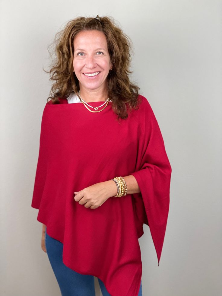 Eden Poncho-Scarlet. One Size Winter Poncho In Solid Color, Winter Poncho In One Size, One Size Winter Poncho, Oversized Solid Poncho With Batwing Sleeves, Oversized Solid Color Poncho With Batwing Sleeves, Versatile Fall Poncho, Oversized Solid Poncho For Layering, Casual One-size Poncho, Red One-size Poncho Cape