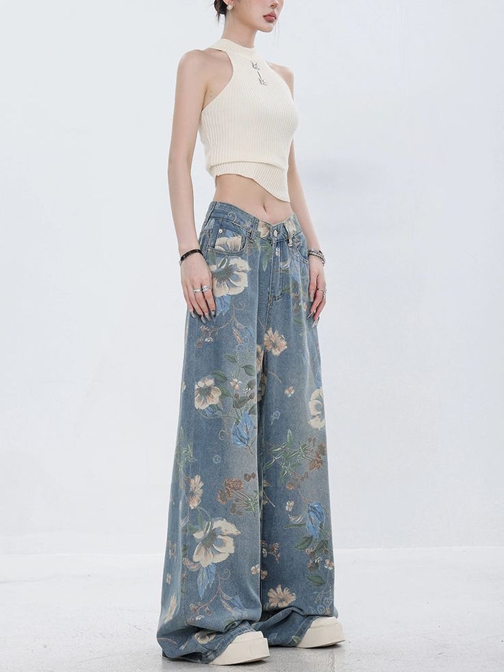 Cute denim pants with a floral design that attracts attention.

This piece is a well-balanced mix of casual and girly elements.

The thick wide silhouette does not emphasize the line of your legs and makes it easy to maintain balance.
◾️Model
Height/Weight：163cm(64.1in)/44kg(97.0lb)
Fitting Size：S





Cm
(inches)

Length
Waist
Hip


S
104(40.9)
62(24.4)
104(40.9)


M
106(41.7)
66(25.9)
108(42.5)


L
108(42.5)
70(27.5)
112(44.0)


XL
110(43.3)
74(29.1)
116(45.6) Casual Mid-rise Bottoms With Floral Print, Mid-rise Denim Bottoms With Floral Print, Bohemian Denim Blue Jeans For Spring, Mid-rise Cotton Bottoms With Floral Print, Cotton Straight Leg Bottoms With Floral Print, Summer Floral Print Denim Pants, Straight Leg Cotton Bottoms With Floral Print, Mid-rise Cotton Floral Print Bottoms, Mid-rise Floral Print Cotton Bottoms