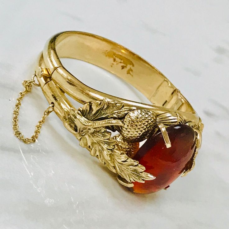 Large Amber Like Stone Fine Detailed Metalwork Bangle Bracelet With Safety Chain Signed Collectable Piece The Brand History Back To Year 1876. Great Vintage Condition Sell As Is Sale Is Final Vintage Bangles, Safety Chain, Gold Orange, Orange Gold, Bangle Bracelet, Womens Jewelry Bracelets, Metal Working, Bangle Bracelets, Amber