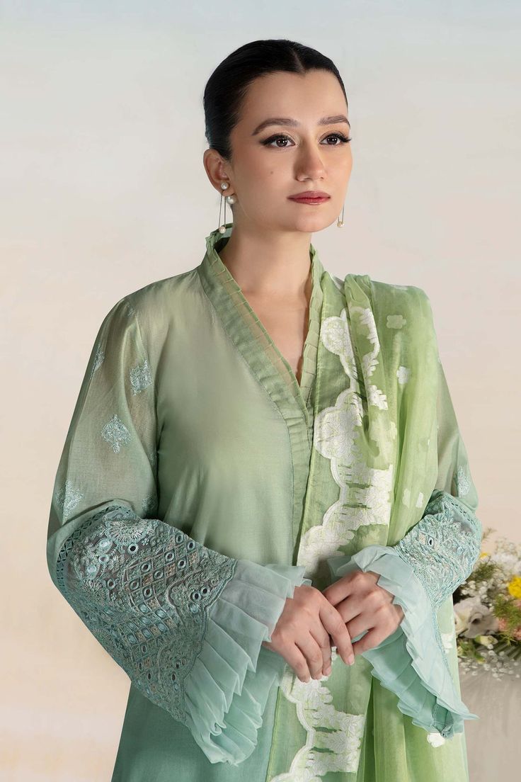 Classic Mint Green Maria B Luxury Formal Pakistani Salwar Suit has an alluring gold shade that will give you a head-turning look on the big day. Delivery: 7 Business Days Detailed Description: SKU: PB688 Detailing: Embroidery, Threads, Sequins, Motifs, Stones Color: Mint Green Fabric: Organza, Chiffon, Net Design: Fully Embellished Dress with Embroidery Event: Party wear, Festive Elegant Green Churidar With Sheer Dupatta, Elegant Designer Green Churidar, Elegant Pista Green Churidar With Traditional Drape, Formal Green Traditional Wear With Chikankari Embroidery, Wedding Green Blouse Piece With Sheer Dupatta, Elegant Pista Green Silk Churidar, Formal Pista Green Sets With Chikankari Embroidery, Elegant Green Silk Churidar, Elegant Designer Pista Green Churidar