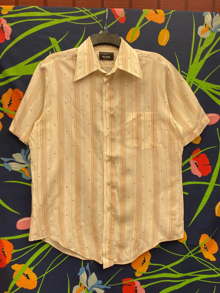 Vintage flared call Erin button up shirt. Vintage short sleeve button up collared shirt. Vintage collared shirt. Vintage JCPenney button up shirt. Vintage striped collared shirt camp collar, oxford, oxford button up, short sleeve oxford, button up, camp collar button, collared shirt, vintage camp collar, floral shirt, collared shirt, button down,hawaiian shirt, vintage oxford, collared Vintage Shirt With Pockets At Affordable Price, Cheap Collared Yellow Shirt, Affordable Cream Button-up Top, Cheap Blouse With Peter Pan Collar And Button Closure, Cheap Vintage Shirt With Snap Buttons, Summer Button-up Shirt With Buttons, Summer Short Sleeve Shirt With Collar And Buttons, Summer Button-up Top With Placket, Summer Collared Short Sleeve Shirt With Buttons