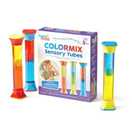 a set of three colorful tubes next to each other in front of a boxed box