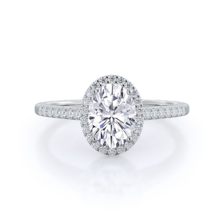 an oval cut diamond ring with pave set shoulders