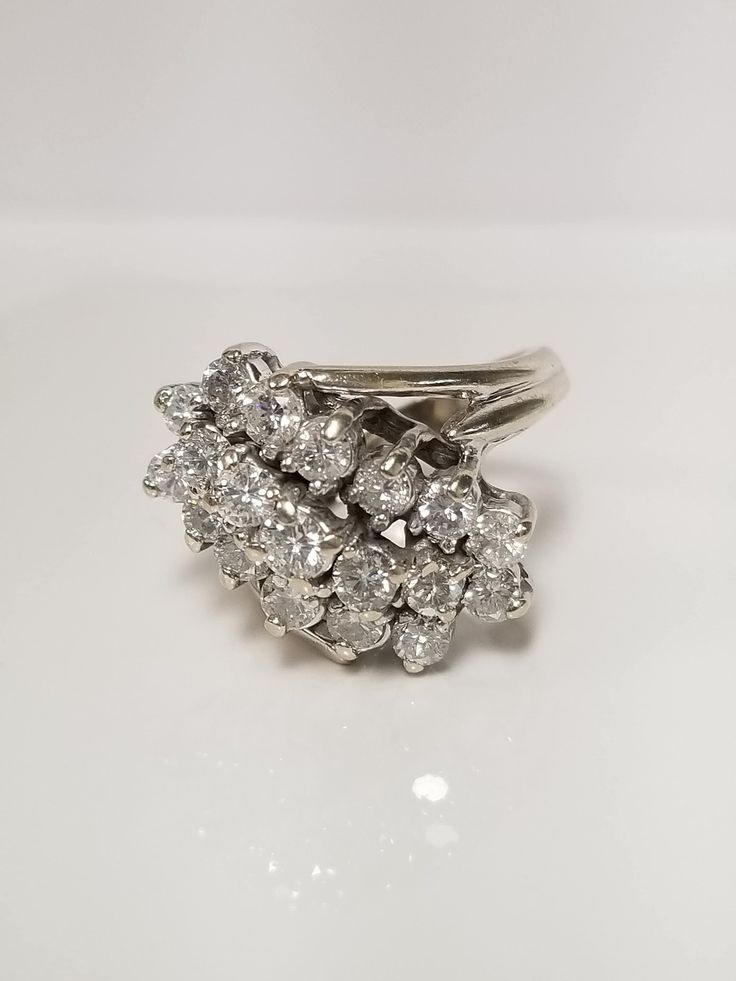 a white gold and diamond cluster ring