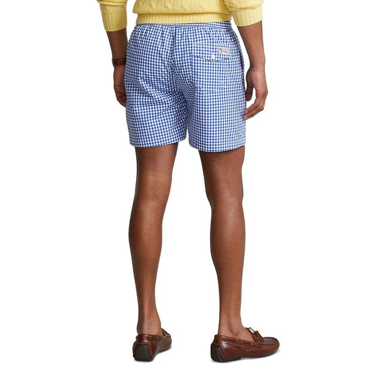 Finished with our signature embroidered Pony, these mesh-lined swim trunks deliver polished Polo Ralph Lauren style—in or out of the water..Approx. model height is 6'1' and he is wearing a size medium.Approx. inseam: 5-¾'; 10' rise.Classic Fit.Elastic drawstring waistband.Side on-seam pockets.Back right buttoned pocket.Woven 'Polo Ralph Lauren Swimwear' label at the back pocket.Mesh brief for additional support.Signature embroidered Pony at the left hem.Shell and brief: polyester.Machine washabl Casual Relaxed Fit Swim Trunks For Pool, Summer Short Length Swim Trunks For Pool, Summer Swim Trunks For Pool, Short Length, Cotton Swim Trunks With Built-in Shorts For Pool, Fitted Swim Trunks For Summer Swimming, Fitted Swim Trunks For Summer Pool, Fitted Summer Swim Trunks For Pool, Beach Season Water Polo Swim Trunks, Beachwear Swim Trunks For Water Polo