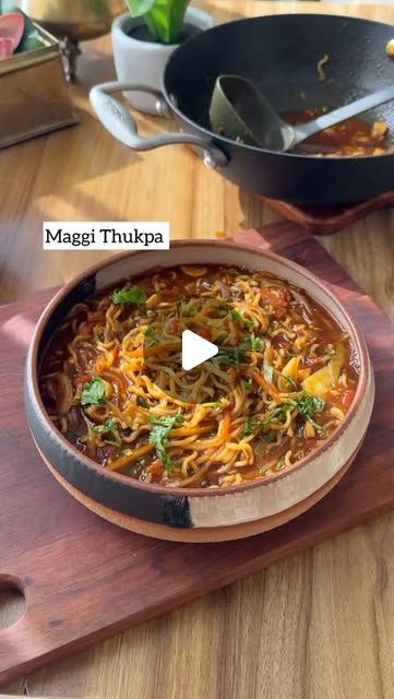 Oh, Cheat Day ! on Instagram: "10 Minutes only !! 

Maggi Thukpa, this is comfort in a bowl !!

Recipe :- 

Start by sauteing finely chopped ginger, garlic, and green chili in some oil. Add 1 sliced onion and cook until soft, then toss in 1/3 cup cabbage sliced, some mushroom, some carrot julienne and 1 chopped tomato. Use veggies of choice. 

Once the tomatoes are soft, mix in a packet of Maggi masala, 3 cups of vegetable water, 1/2 veg stock it use veg stock water, 1/2 tbsp dark soy sauce, and 1 tsp hot chili sauce or sriracha, 1 tbsp ketchup, let it boil well cooking until the carrots are almost tender. 

Finally, add 1 packet  Maggi noodles and cook for about 2 minutes. Serve hot with finely chopped coriander, spring onion, and a squeeze of lemon juice.

Do a taste test, if needed add