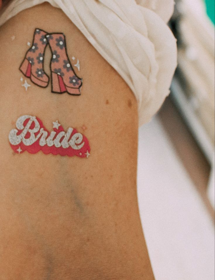 a bride tattoo on the back of a woman's left side ribcage