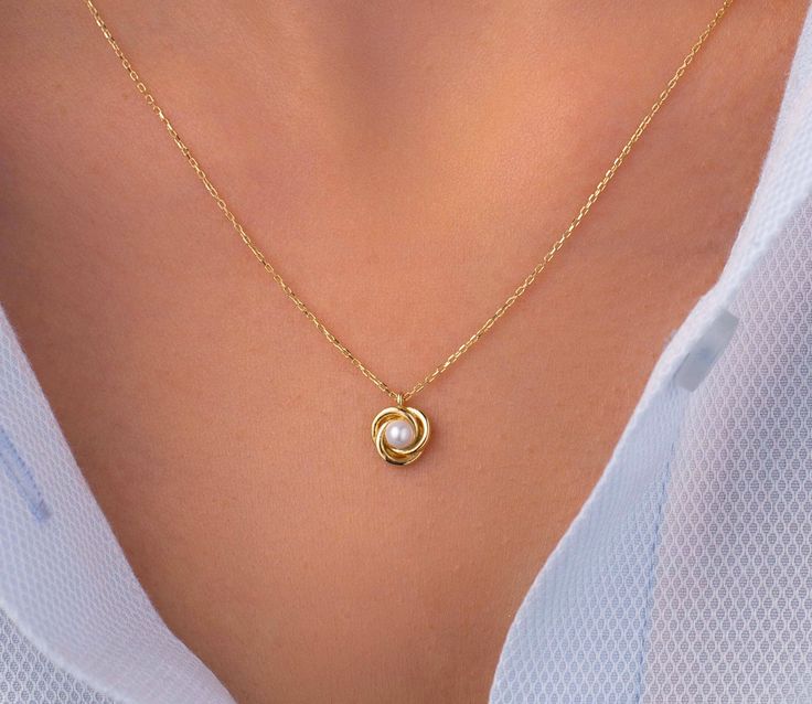 Our tiny pearl necklace is made of 14k solid gold. It has a dainty and minimalist style that everyone from 7 to 70 loves it! The tiny pearl is placed on three gold hoops that look like a small flower. When you consider our gold pearl pendant necklace as a gift, it will make your loved ones happy on their birthday, mother's day, valentine's day, anniversaries, graduation, or women's day.  🎁 If you want, you can add a gift note for your loved ones. It arrives in a special jewelry gift box. ✨ We r Minimalist 14k Gold Pearl Necklace Gift, Tiny Pearl Necklace, Gold Pearl Necklace, Gifts For My Wife, Pearl Pendant Necklace, Special Jewelry, Gold Pearl, Minimalist Necklace, Bridal Gifts