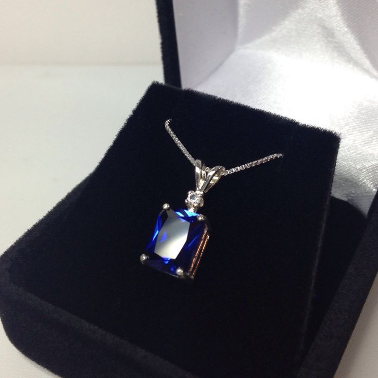 "Beautiful Blue & White Sapphire Pendant Necklace * Emerald Cut Blue Sapphire measures 8x6mm * Brilliant Cut White Sapphire Accent * 2cts total Gemstone weight * Solid Sterling Silver * 18\" Sterling Silver Chain Included Hallmarked & Gift Ready! Matching Earrings & Ring Also Available! These pieces can also be set in 14kt Yellow Gold or 14kt White Gold - message me for details This 2ct Sapphire is Laboratory Grown & is identical to natural in every way, including Chemistry, Comp Beauty And The Beast Bedroom, Sapphire Pendant Necklace, Necklace Emerald, Sapphire Necklace Pendants, Fine Art Jewelry, Sapphire Pendant, Lovely Necklace, White Sapphire, Bridal Gifts