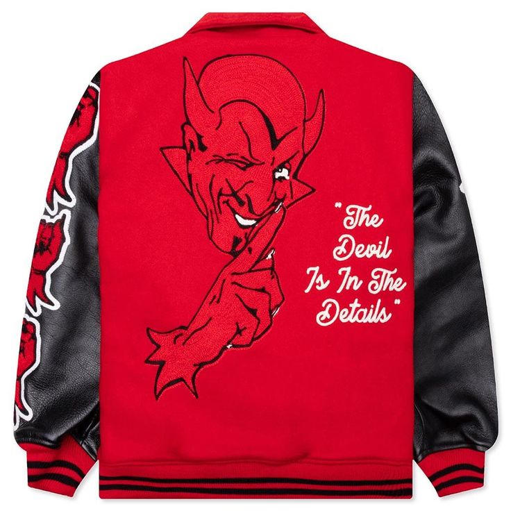 Made from a blend of wool and nylon, the Saint Michael Devil Varsity Jacket takes on a premium aesthetic. The design features leather sleeves along with embroidered patches and phrasing. The snap button closure secures the design, while the hand pockets complete the remainder of the design. Wool/nylon blend Snap button closure Leather sleeves Embroidered patches/phrasing Hand pockets Striped ribbed trims Style No: SM-A22-0000-035 Hooded Embroidered Varsity Jacket For Fall, Red Patches Outerwear For Streetwear, Red Streetwear Outerwear With Patches, Red Patched Outerwear For Streetwear, Red Long Sleeve Varsity Jacket With Patchwork, Red Patchwork Varsity Jacket, Red Varsity Jacket For Fall Streetwear, Red Patchwork Long Sleeve Varsity Jacket, Red Patchwork Outerwear For Streetwear