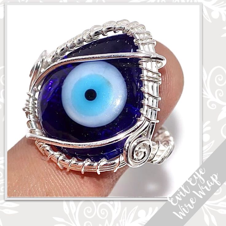 Evil Eye Eclectic Silver Wire Wrapped Artisan Ring, Sz 8 (Royal Blue, Lt Blue) Fabrication: Artisan Handcrafted, Handmade Metal: Plated Sterling Silver 925 Features: Wire Wrapped Design With Multi-Tiered Woven Band; Scroll Accents Main Stone: Glass, Pear Shape (Royal Blue, Light Blue, Black) Style: Boho, Gypsy, Festival, Ethnic, Bollywood, Bohemian, Hippie Size: 8 Created In / Purchased From: Jaipur, India Additional Wire Wrap Rings Available In Many Stones & Colors! From My Worldwide Collection Handmade Mystical Blue Jewelry, Mystical Blue Round Jewelry, Eye-catching Handmade Jewelry For Gifts, Artistic Blue Nickel-free Jewelry, Adjustable Blue Jewelry With Unique Variations, Unique Handmade Blue Jewelry, Artistic Blue Metal Jewelry, Nickel Free Blue Metal Rings, Unique Blue Wire Wrapped Rings