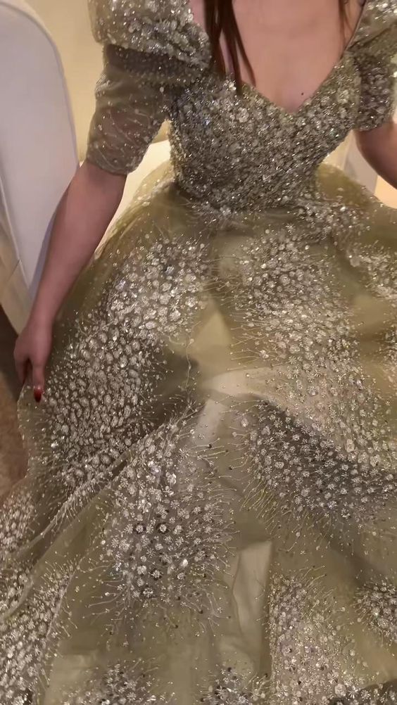 Luxury Ball Gown For Prom Season Banquet, Luxury Dress For Festive Banquet, Luxury Ball Gown For Banquet During Prom Season, Luxury Organza Prom Dress, Green Organza Dress For Party, Luxury Organza Dresses For Prom, Green Organza Evening Dress For Banquet, Sequin Fabric For Wedding Prom Season, Glamorous Gold Tulle Dresses